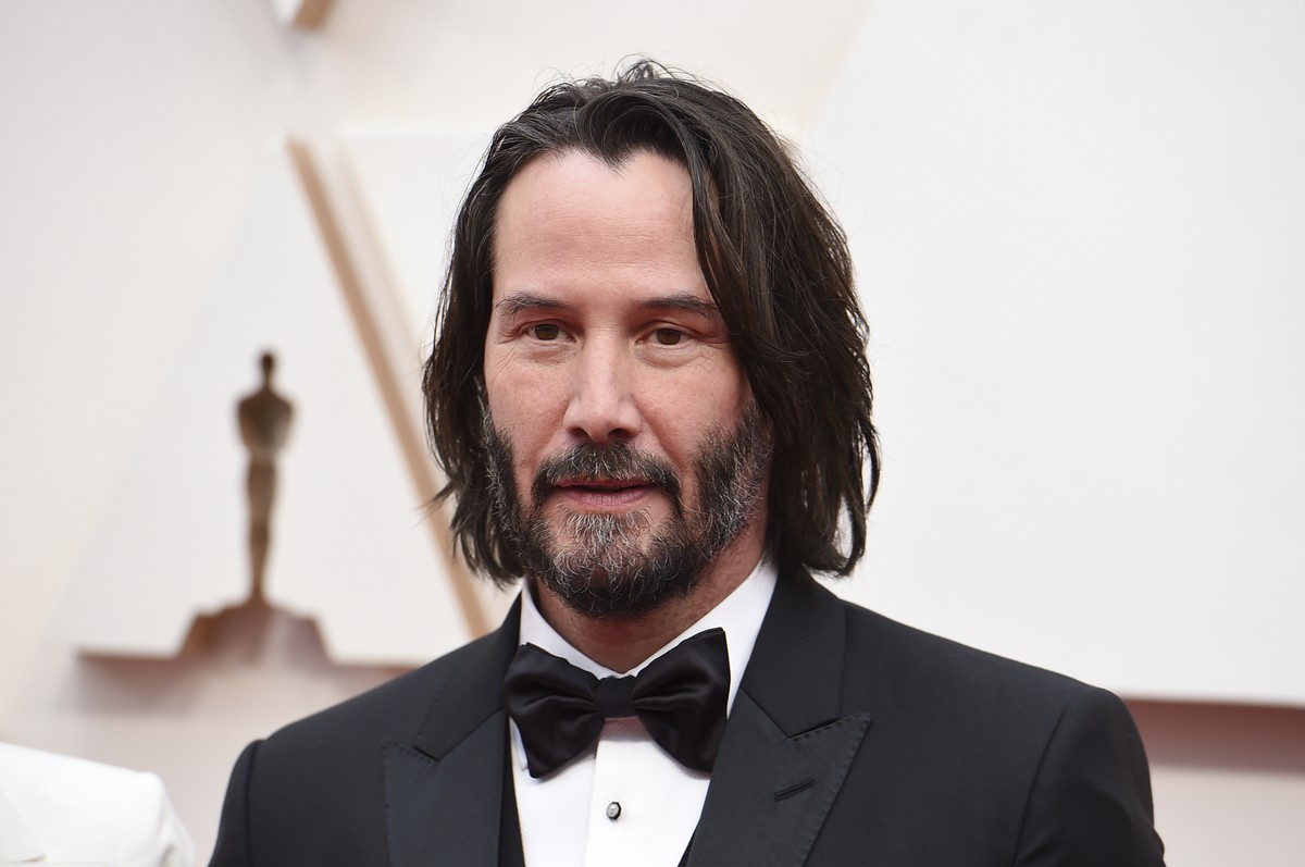 FILE - Keanu Reeves appears at the Oscars in Los Angeles on Feb. 9, 2020. Reeves and Alex Winter, who starred in the ?Bill &amp; Ted? film franchise, are reuniting on Broadway for a revival of the bra ...