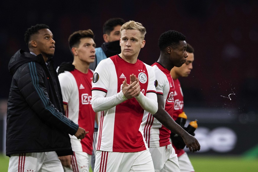 epa08254136 Donny van de Beek of Ajax reacts at the end of the UEFA Europa League round of 32, second leg, soccer match between Ajax and Getafe at the Johan Cruyff Arena in Amsterdam, the Netherlands, ...