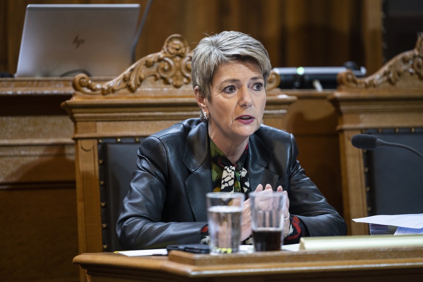 epa10569216 Swiss Finance Minister Karin Keller-Sutter speaks during an extraordinary session of the Federal Assembly in the Council of States in Bern, Switzerland, 12 April 2023. The extraordinary se ...