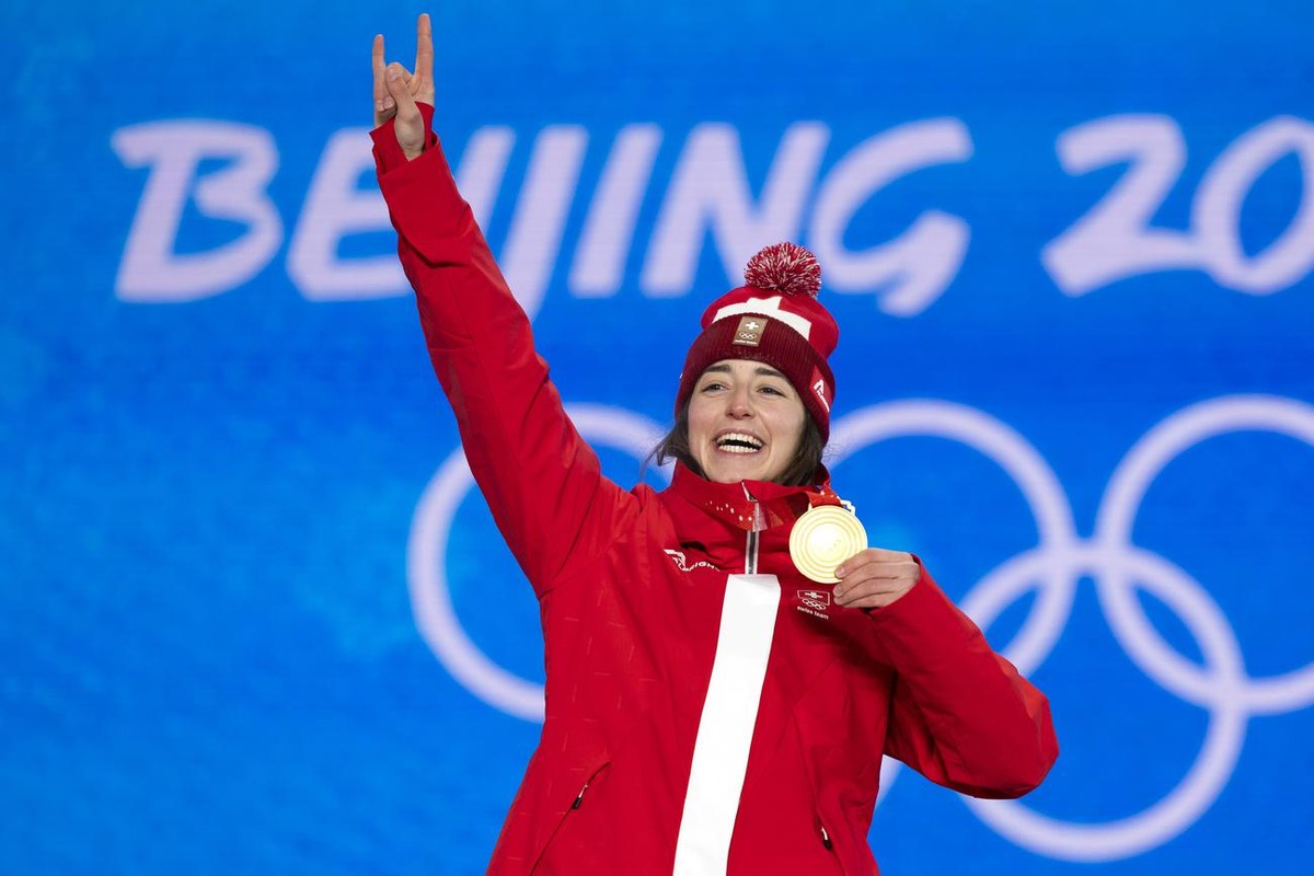 Mathilde Gremaud of Switzerland, gold medal winner in the women's Freestyle Skiing Slopestyle, poses with the medal during the medal ceremony at the 2022 Winter Olympics in Zhangjiakou, China, on ...