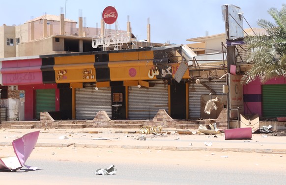epa10579956 Damaged shops during the ongoing fighting between the Sudanese army and paramilitaries of the Rapid Support Forces (RSF) in Khartoum, Sudan, 19 April 2023. A power struggle erupted since 1 ...