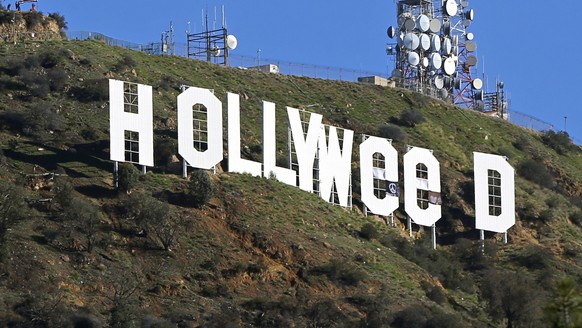 FILE - In this Jan. 1, 2017, file photo, the famed Hollywood sign is seen altered to read &quot;HOLLYWeeD,&quot; in Los Angeles. Los Angeles police said in a statement that 30-year-old Zachary Cole Fe ...