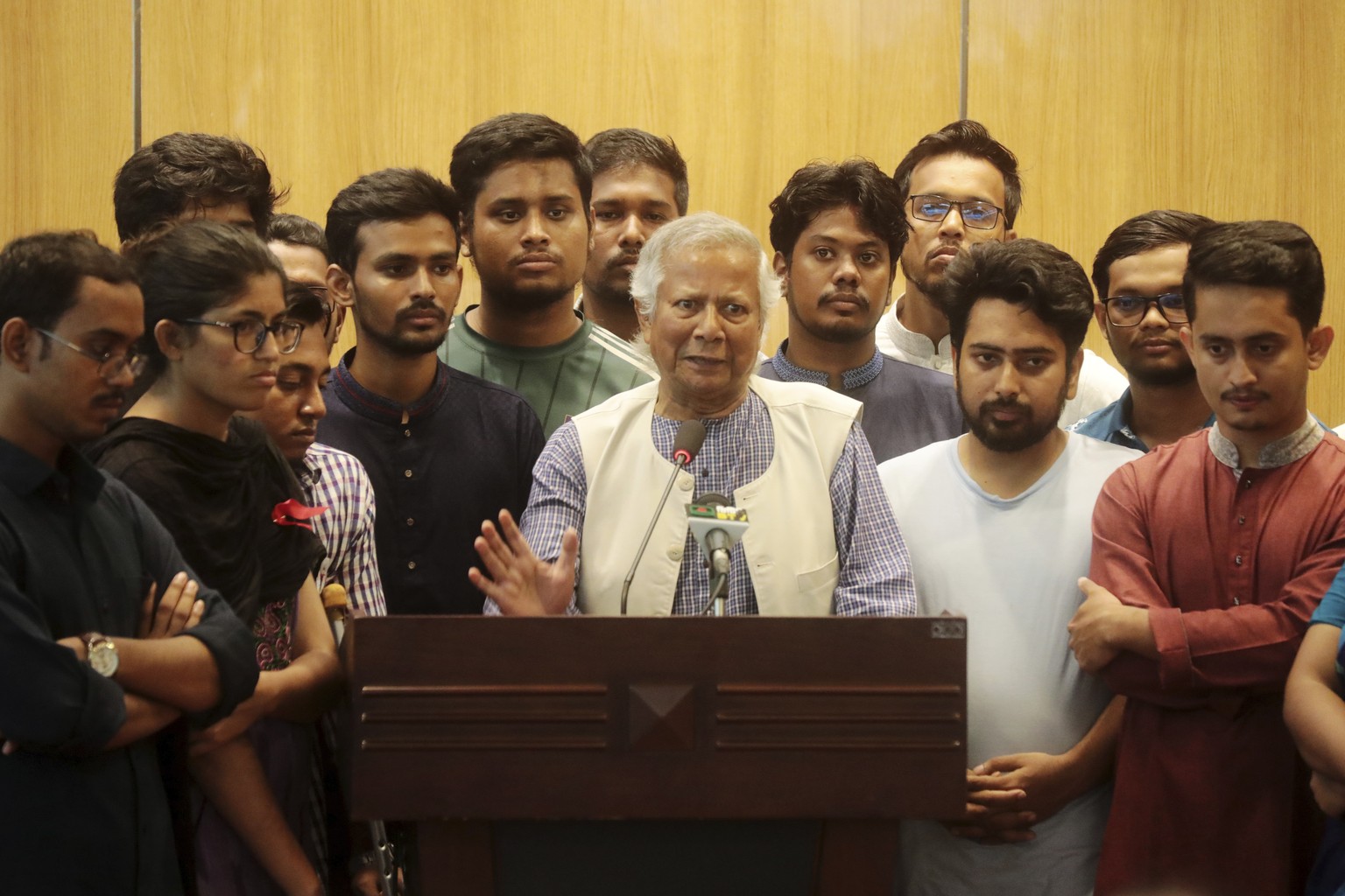 Nobel laureate Muhammad Yunus speaks to the media after his arrival at the airport in Dhaka, Bangladesh, Thursday, Aug. 8, 2024. (AP Photo/Ahadul Karim Khan)
