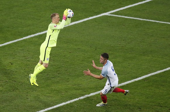 Football Soccer - England v Russia - EURO 2016 - Group B - Stade Velodrome, Marseille, France - 11/6/16 - England&#039;s goalkeeper Joe Hart makes a save next to Gary Cahill. REUTERS/Robert Pratta