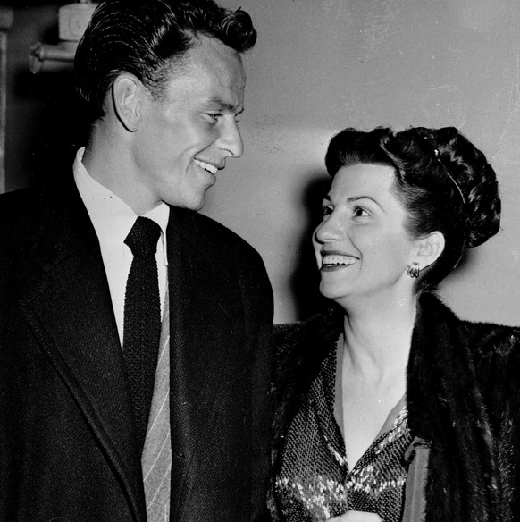 FILE - In this Oct. 23, 1946 file photo, singer Frank Sinatra and his wife Nancy smile broadly as they leave a Hollywood night club following a surprise meeting. Nancy Sinatra Sr., the childhood sweet ...