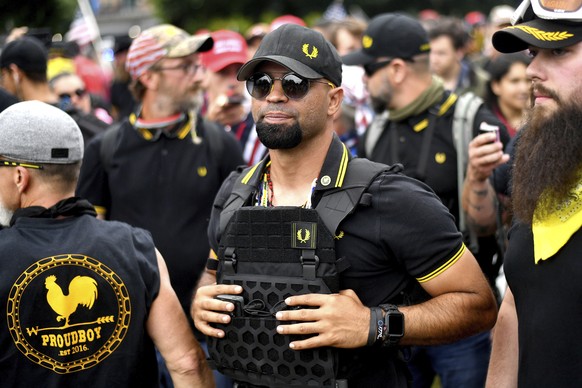 FILE - In this Aug. 17, 2019, file photo, Proud Boys chairman Enrique Tarrio rallies in Portland, Ore. Outside pressures and internal strife are roiling two far-right extremist groups after members we ...