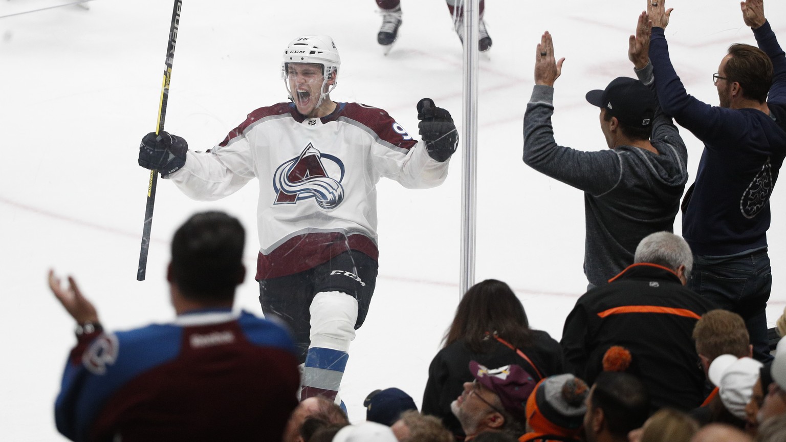 Colorado Avalanche&#039;s Mikko Rantanen, center, of Finland, celebrates his overtime goal in an NHL hockey game against the Anaheim Ducks on Sunday, Nov. 18, 2018, in Anaheim, Calif. The Avalanche wo ...