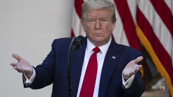 President Donald Trump gestures during a White House National Day of Prayer Service in the Rose Garden of the White House, Thursday, May 7, 2020, in Washington. (AP Photo/Alex Brandon)
Donald Trump