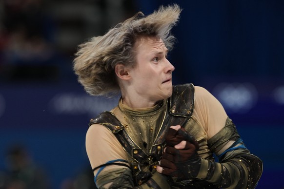Ilia Malinin of the United States competes during the men's figure skating short program at the 2026 Winter Olympics, in Milan, Italy, Tuesday, Feb. 10, 2026. (AP Photo/Francisco Seco)
Ilia Malin ...