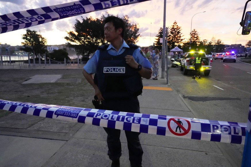 Police cordon off an area at Bondi Beach after a reported shooting in Sydney, Sunday, Dec. 14, 2025. (AP Photo/Mark Baker)
Australia Bondi Beach Shooting