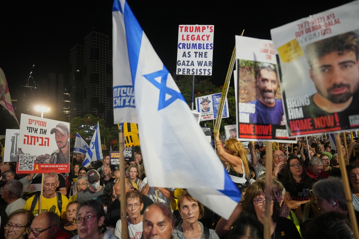 Relatives and supporters of Israeli hostages held in the Gaza Strip attend a rally demanding their release from Hamas captivity and calling for an end to the war, in Tel Aviv, Israel, Saturday, Sept.  ...