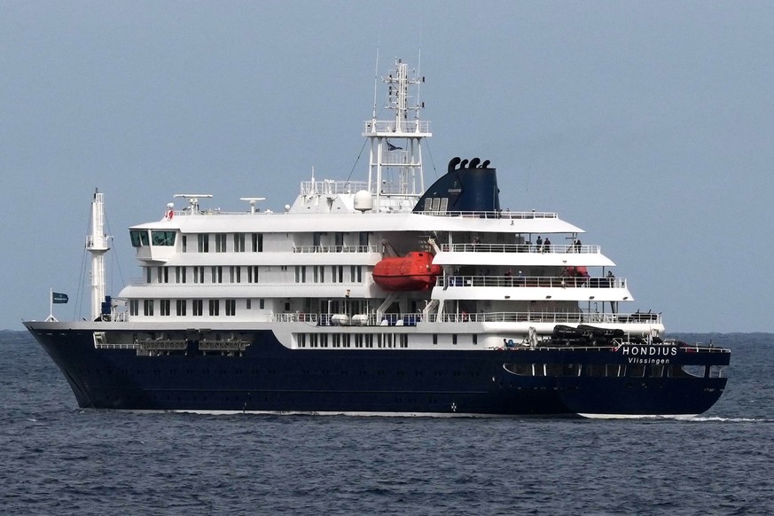 The MV Hondius cruise ship departs the port in Praia, Cape Verde, Wednesday, May 6, 2026. (AP Photo/Misper Apawu)
Cape Verde Hantavirus Ship