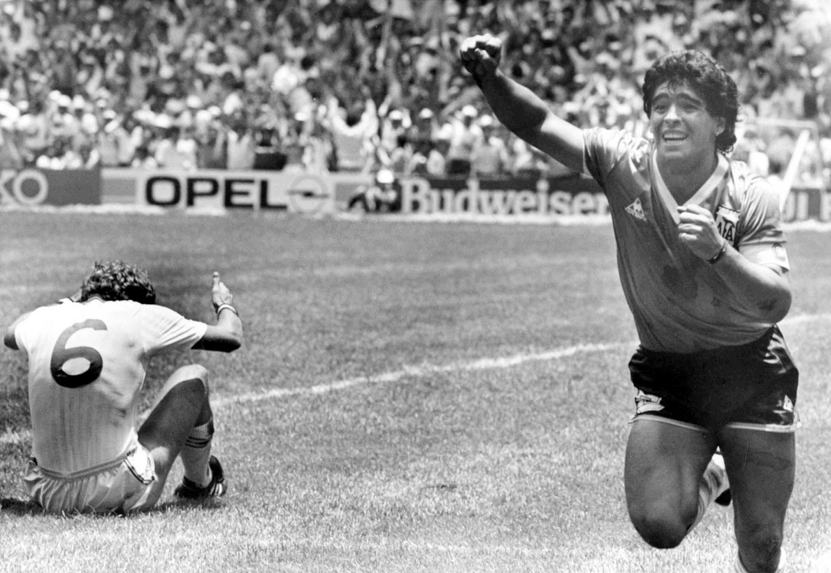 Argentina's Diego Maradona runs across the soccer field in jubilation after he had scored his second goal against England in the World Cup quarter final, in Mexico City, Mexico, on June 22, 1986. ...