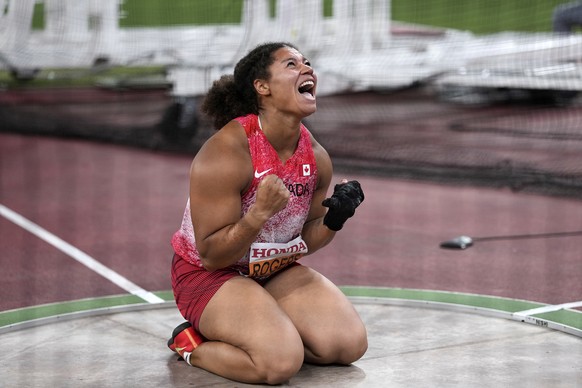 Canada&#039;s Camryn Rogers reacts after winning the gold medal in the women&#039;s hammer throw final at the World Athletics Championships in Tokyo, Monday, Sept. 15, 2025. (AP Photo/Matthias Schrade ...