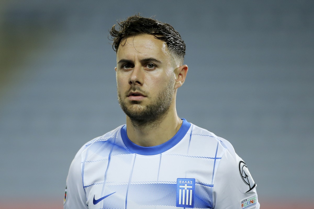 FILE - Greece's George Baldock stands on the pitch before the Euro 2024 group B qualifying soccer match between Gibraltar and Greece at the Algarve stadium outside Faro, Portugal, Friday, March 2 ...