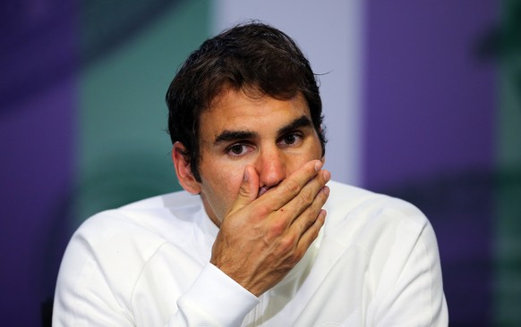 FILE - In this July 8, 2016, file photo, Roger Federer of Switzerland gives a press conference after being beaten in his men&#039;s semifinal singles match against Milos Raonic of Canada, at the Wimbl ...