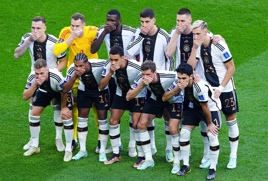Mandatory Credit: Photo by Javier Garcia/Shutterstock 13626471f German players cover there mouths in protest as they pose for a team photo Germany v Japan, FIFA World Cup, WM, Weltmeisterschaft, Fussb ...