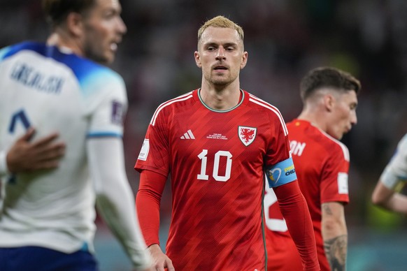 FILE - Wales&#039; Aaron Ramsey walks along the pitch at the end of the World Cup group B soccer match between England and Wales, at the Ahmad Bin Ali Stadium in Al Rayyan , Qatar, Tuesday, Nov. 29, 2 ...
