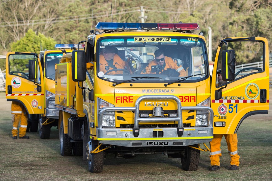 epa07826954 A crew of regional firefighters prepare to return to fight fires burning near Canungra, Queensland, Australia, 07 September 2019 (issued 08 September 2019). A number of homes have been des ...