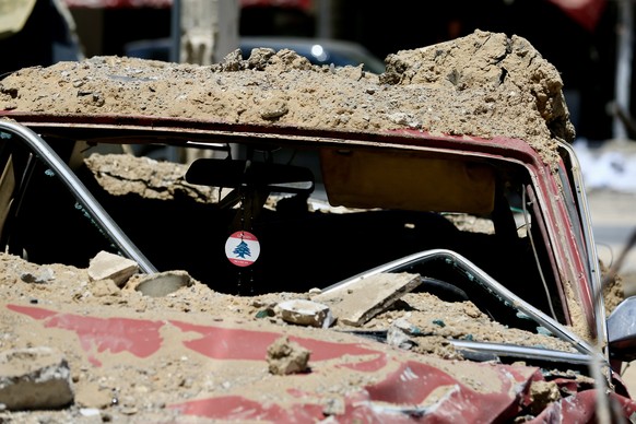 KEYPIX - epa13033008 A damaged car is seen following Israeli strikes in Tyre, Lebanon, 12 June 2026. According to the Lebanese Ministry of Health, as of 11 June, Israeli attacks across Lebanon have ki ...