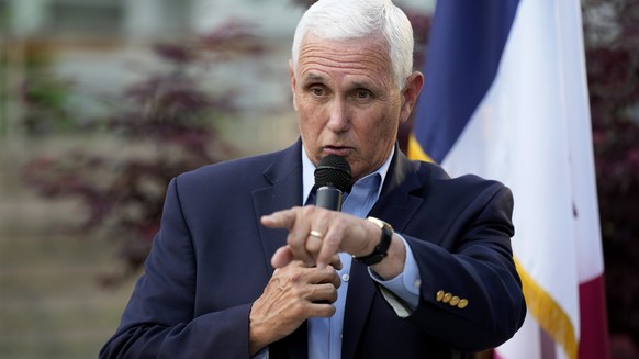 Former Vice President Mike Pence addresses local residents at a meet and greet on Tuesday, May 23, 2023 in Des Moines, Iowa.  (AP Photo/Charlie Neibergall)