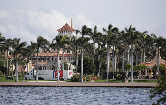 A moving truck is parked outside Mar-a-Lago in Palm Beach, Fla., on Monday, Jan. 18, 2021. President Donald Trump is expected to return to his residence on Wednesday, Jan. 20. (AP Photo/Terry Renna)