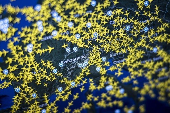 Aircrafts are displayed on a screen showing a flight radar of Switzerland, on Wednesday, June 15, 2022 in Zurich, Switzerland. Due to an IT breakdown at Skyguide, Zurich and Geneva airports are curren ...