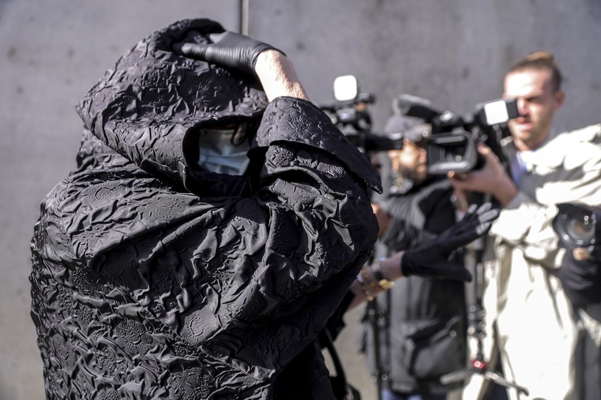 KEYPIX - epa11923429 Marie France, alleged ex-wife of former surgeon Joel Le Scouarnec, arrives at the Morbihan criminal court in Vannes, Brittany, France, 25 February 2025. Former surgeon Joel Le Sco ...
