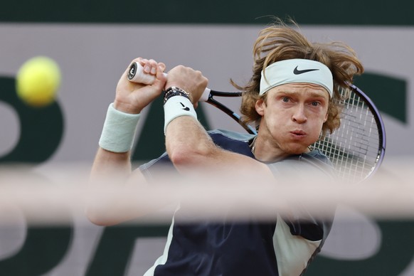 Russia&#039;s Andrey Rublev returns the ball to Italy&#039;s Jannik Sinner during their fourth round match of the French Open tennis tournament at the Roland Garros stadium Monday, May 30, 2022 in Par ...