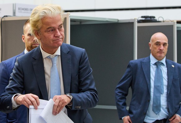 Far-right anti Islam lawmaker Geert Wilders, second left, casts his vote at a polling station during general elections in The Hague, Netherlands, Wednesday, Oct. 29, 2025. (AP Photo/Peter Dejong)
Neth ...
