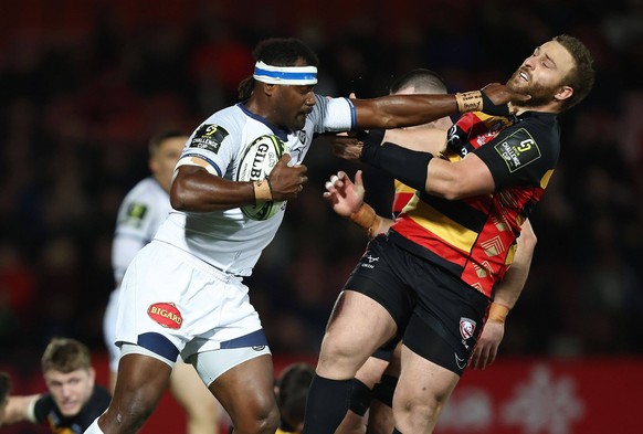 Josaia Raisuqe of Castres Olympique hands off Mayco Vivas of Gloucester Gloucester v Castres Olympique, Investec Challenge Cup, Round of 16, Rugby, Kingsholm, Gloucester, UK - 05 Apr 2024 PUBLICATIONx ...