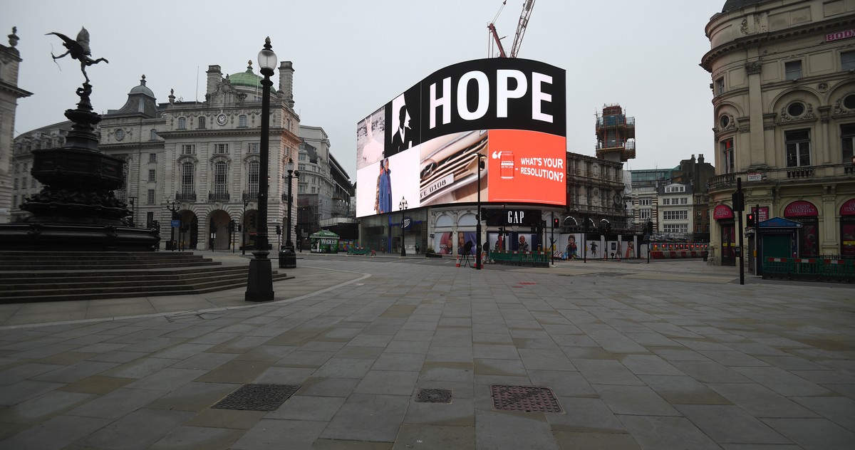 epa08930010 An advertisement showing the word "Hope" is on display at Piccadilly Circus in London, Britain, 10 January 2021. England has entered the third lockdown since the start of the pan ...