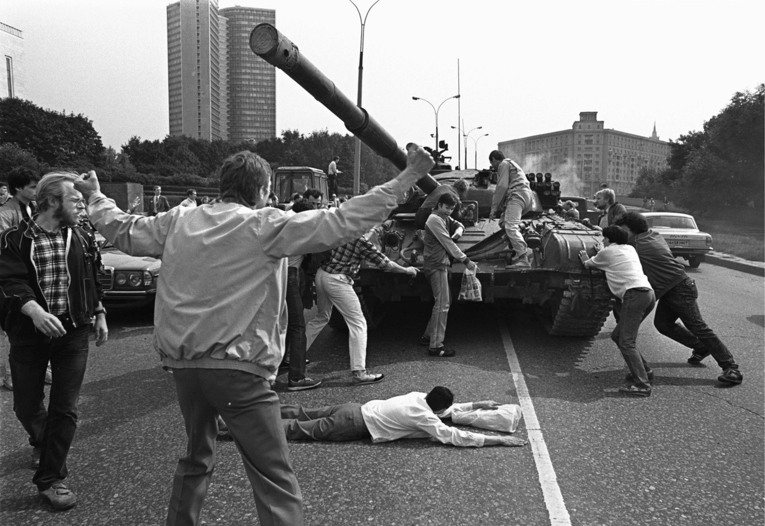 Protesters try to stop a tank during the coup in 19 August 1991. In August 1991, Yeltsin - then president of the Russian Soviet Republic - played a key role in mobilizing popular feeling against an at ...