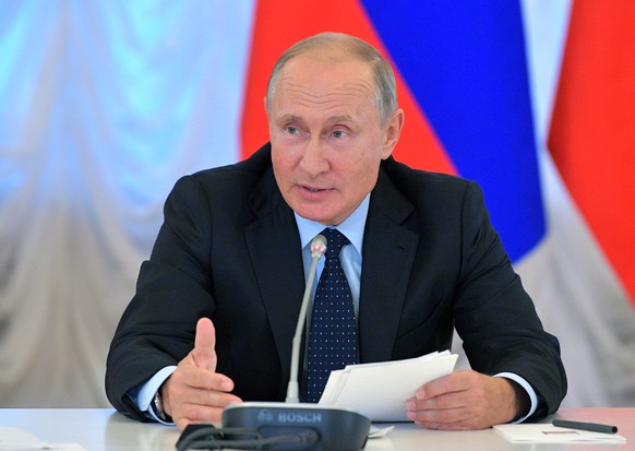 Russian President Vladimir Putin speaks during a meeting of the Russian Presidential Commission for Strategic Development of the Fuel and Energy Sector and Environmental Security in Kemerovo, Russia,  ...