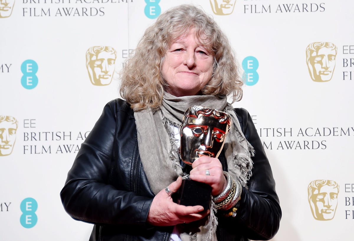epa05161295 Jenny Beavan poses in the press room after winning the Best Costume Design award for 'Mad Max: Fury Road' during the 69th annual British Academy Film Awards at the Royal Opera Ho ...