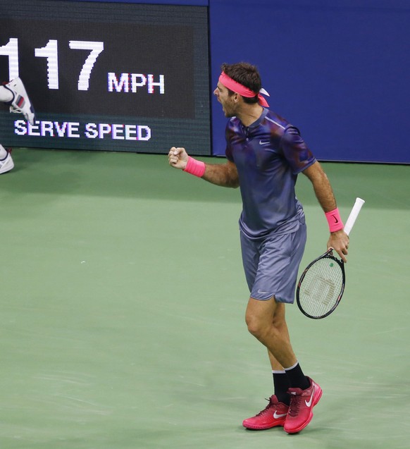 Juan Martin del Potro, of Argentina, reacts toward a crowd of supporters in the first set of a quarterfinal against Roger Federer, of Switzerland, at the U.S. Open tennis tournament in New York, Wedne ...