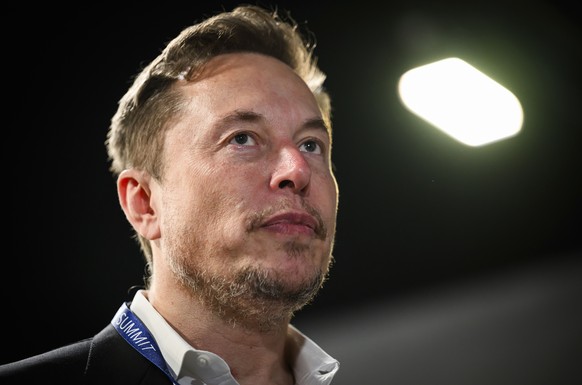 FILE - Tesla and SpaceX&#039;s CEO Elon Musk attends the first plenary session on of the AI Safety Summit at Bletchley Park, on Wednesday, Nov. 1, 2023 in Bletchley, England. (Leon Neal/Pool Photo via ...