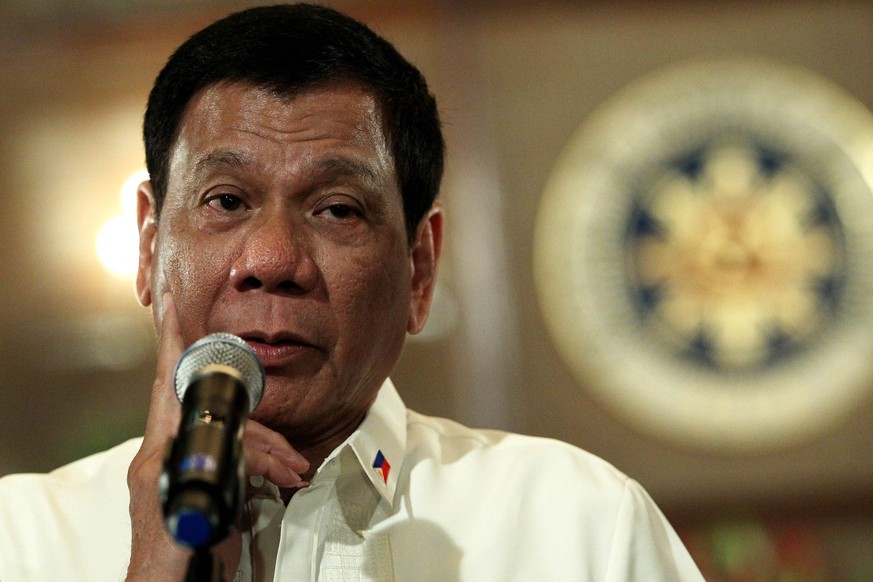 epa05450855 A handout picture made available by the Malacanang Photo Bureau on 01 August 2016 shows Filipino President Rodrigo Duterte speaking inside Malacanang presidential palace in Manila, Philipp ...