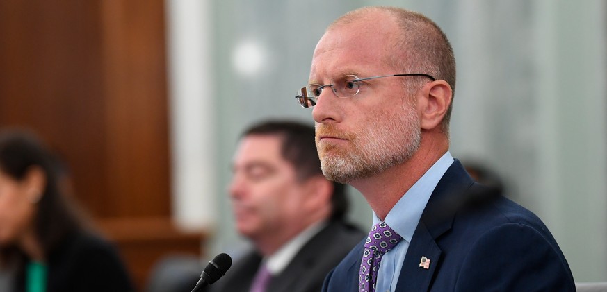 FILE - Brendan Carr listens during a Senate Commerce, Science, and Transportation committee hearing to examine the Federal Communications Commission on Capitol Hill in Washington, June 24, 2020. (Jona ...
