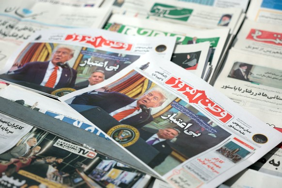 epa12090213 Copies of the Iranian daily newspaper Vatan Emrouz carrying a picture of US President Trump entitled &#039;Unreliable&#039; sit at a kiosk in Tehran, Iran, 11 May 2025. Iran and the US hol ...