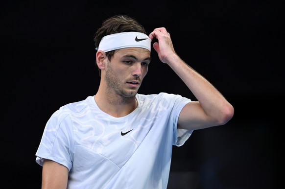 epa10414925 Taylor Fritz of the USA reacts during his second round match agaimst Alexei Popyrin of Australia at the 2023 Australian Open tennis tournament in Melbourne, Australia 19 January 2023. EPA/ ...