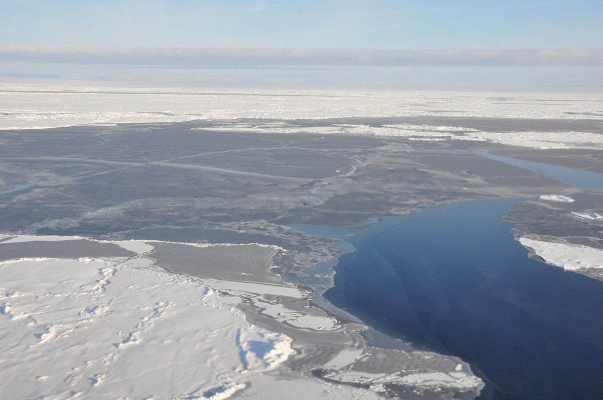 This 2014 photo provided by NOAA shows the Arctic ice coverage. Earth's icy northern region lost more of its signature whiteness that reflects the sun's heat. It was replaced temporarily wit ...