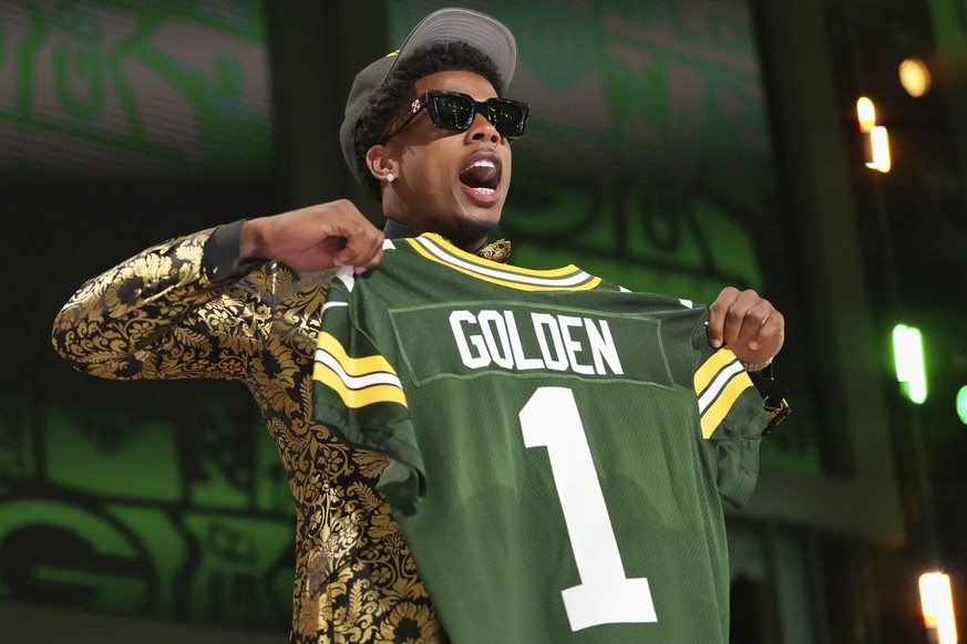 Texas wide receiver Matthew Golden celebrates after being chosen by the Green Bay Packers with the 23rd overall pick during the first round of the NFL football draft, Thursday, April 24, 2025, in Gree ...