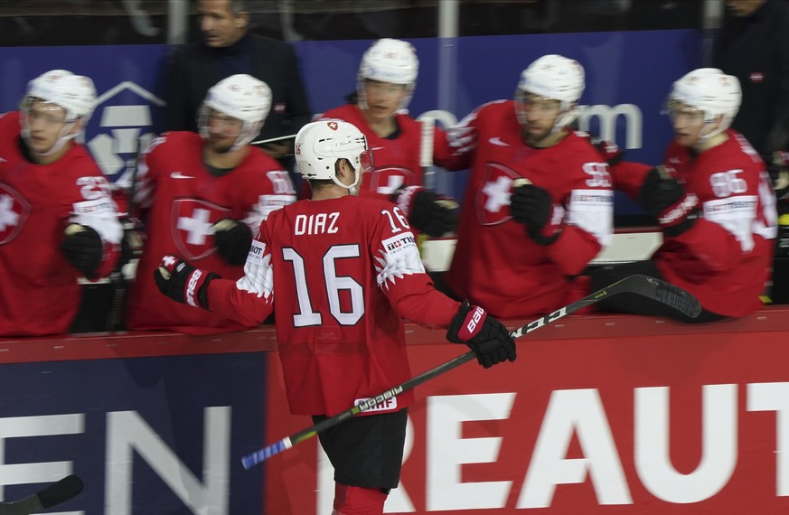 Raphael Diaz of Switzerland, celebrates a goal during the Ice Hockey World Championship group A match between the Switzerland and Slovakia at the Olympic Sports Center in Riga, Latvia, Thursday, May 2 ...