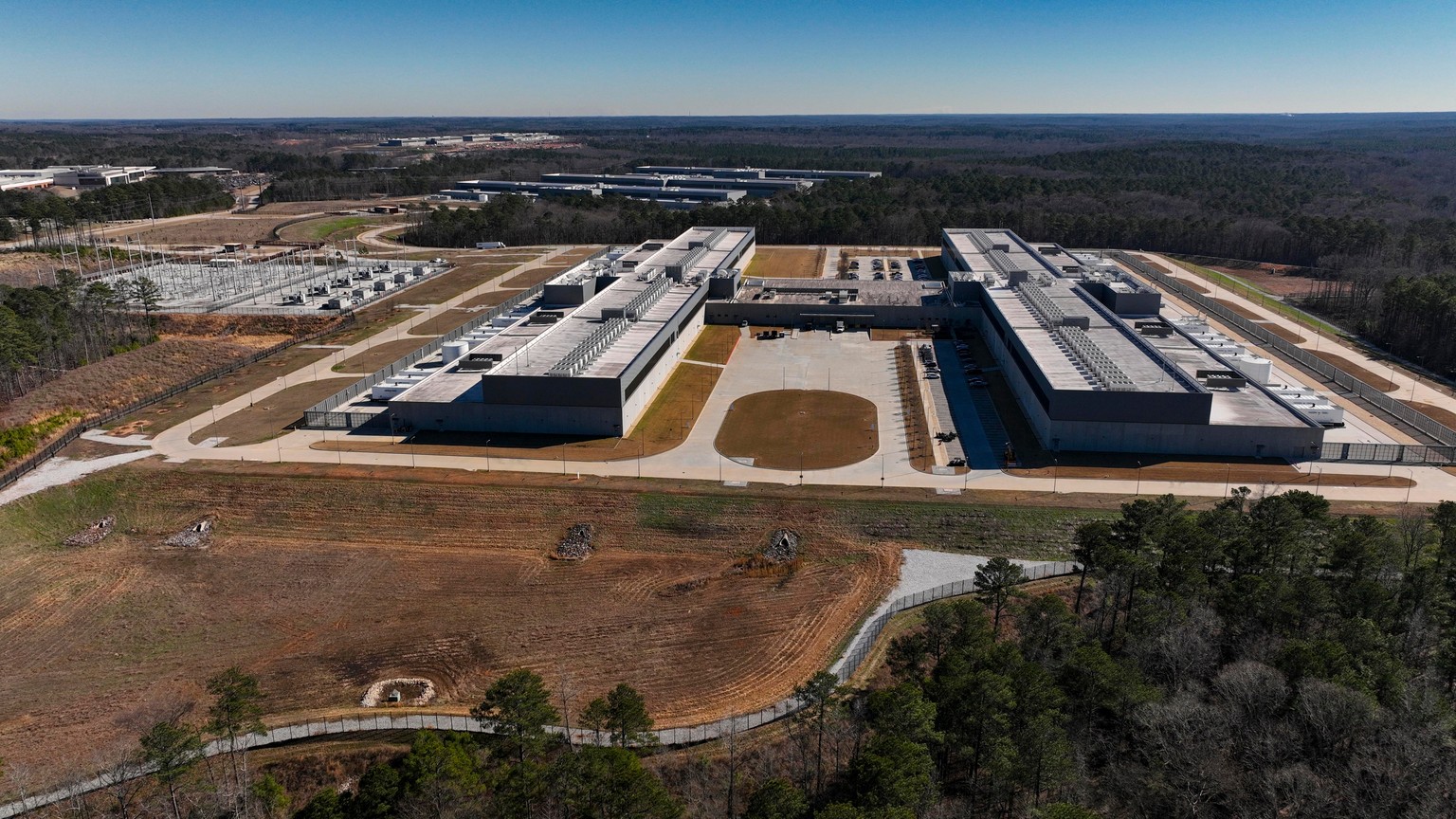 FILE - Meta's Stanton Springs Data Center is visible Jan. 13, 2026, in Newton County, Ga. (AP Photo/Mike Stewart, File)
Climate Data Center Impacts