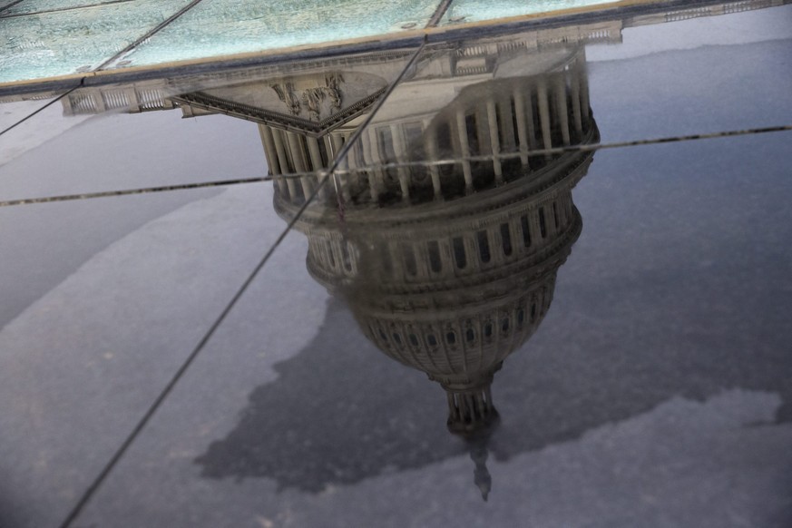 epa05761541 The US Capitol Dome&#039;s reflection in a dry fountain on the East Front of the US Capitol in Washington, DC, USA, 30 January 2017. Over the weekend US Republican Senators John McCain and ...