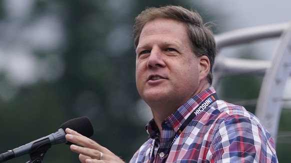 FILE�?? In this July 18, 2021 file photograph, New Hampshire Governor Chris Sununu addresses racing fans at a NASCAR Cup Series auto race in Loudon, N.H. Sununu has been admitted to a hospital, Friday ...