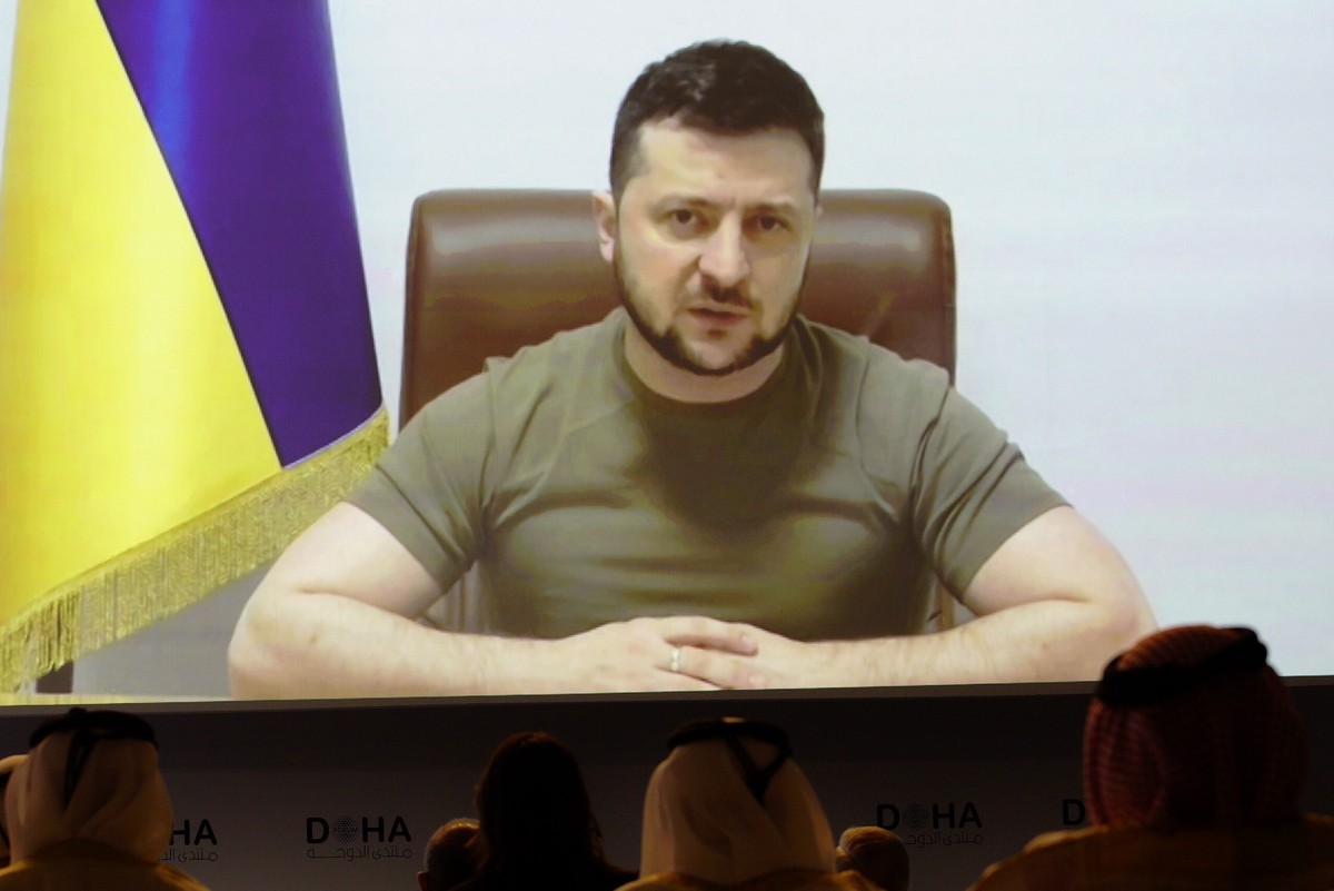 Ukrainian President Volodymyr Zelenskyy speaks via video call to the Doha Forum in Doha, Qatar, Saturday, March 26, 2022. Ukraine's president made a surprise video appearance Saturday at Qatar  ...