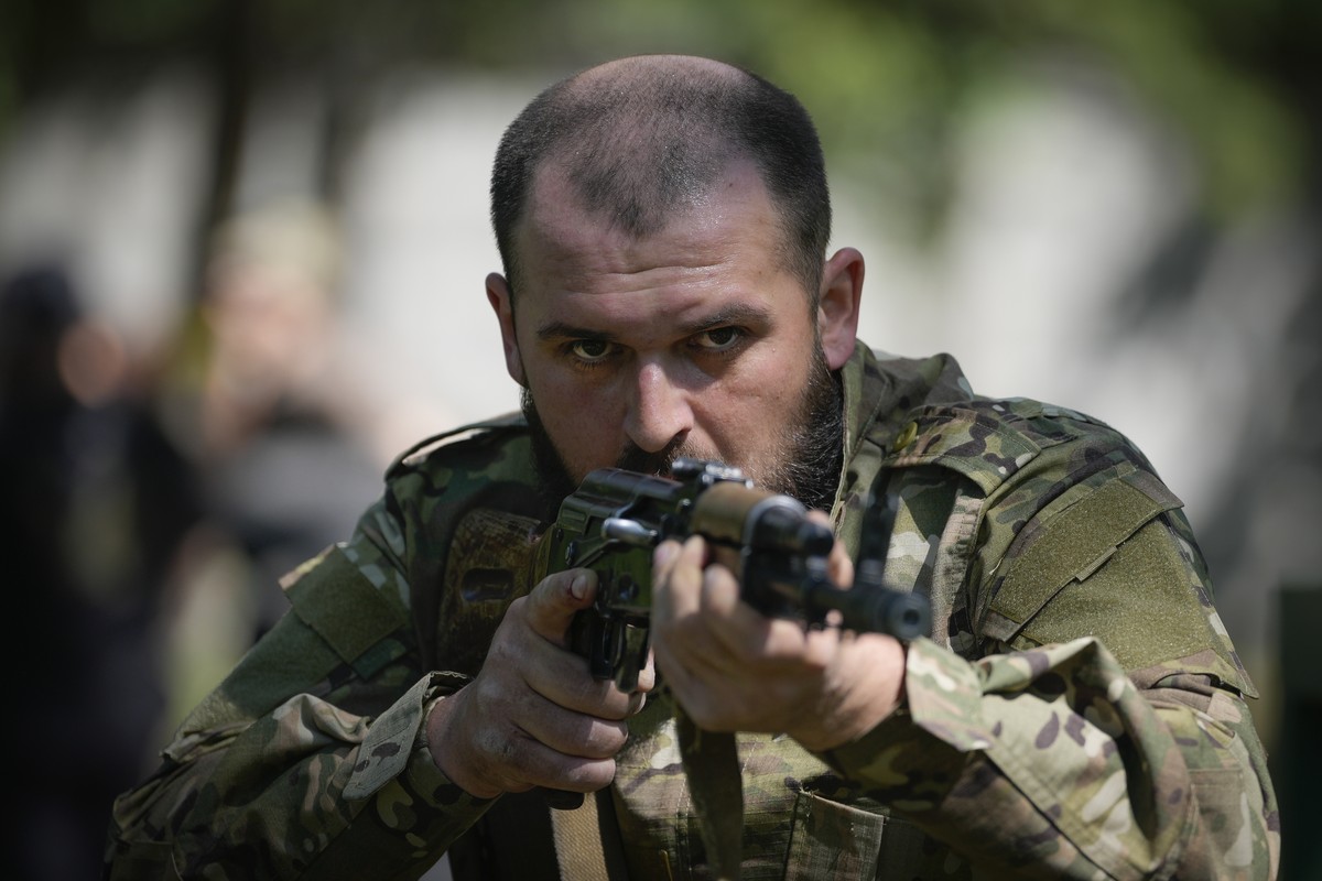 FILE ? A newly recruited soldier trains in Kyiv, Ukraine, on Friday, May 17, 2024. Slowly but steadily this summer, Russian troops are forging through Ukraine's defenses in a relentless onslaught ...