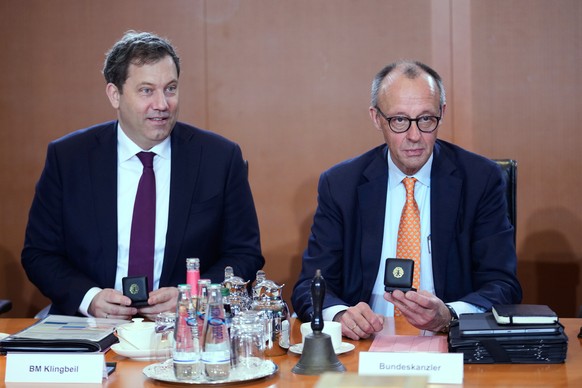 German Chancellor Friedrich Merz, right, and Vice Chancellor Lars Klingbeil attend the cabinet meeting at the chancellery in Berlin, Germany, Wednesday, Jan. 14, 2026. (AP Photo/Ebrahim Noroozi)
Fried ...